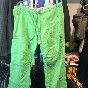 Koi cargo scrub pants.